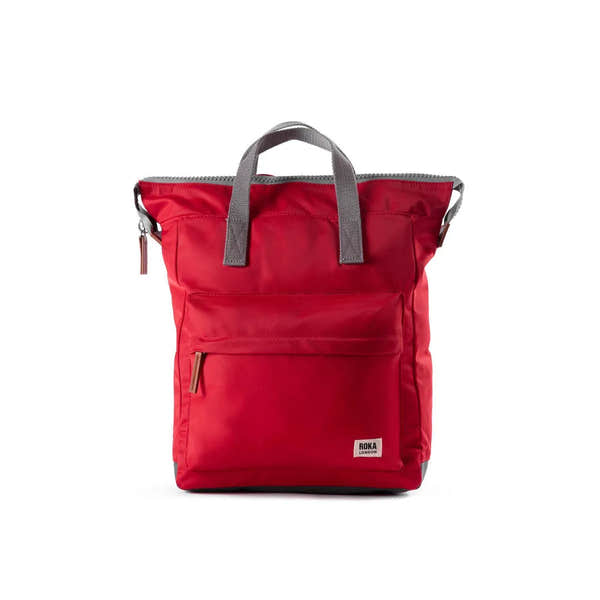 Roka Bantry B cranberry organic recycled nylon tote bag with gray handles and front zip pocket.