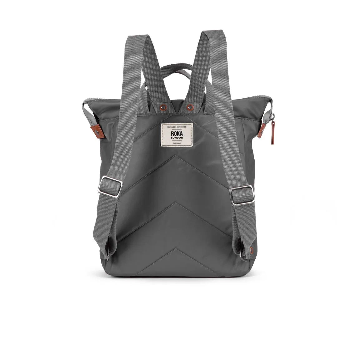 Roka Bantry B Graphite backpack made from recycled nylon, featuring gray straps and a durable, eco-friendly design.