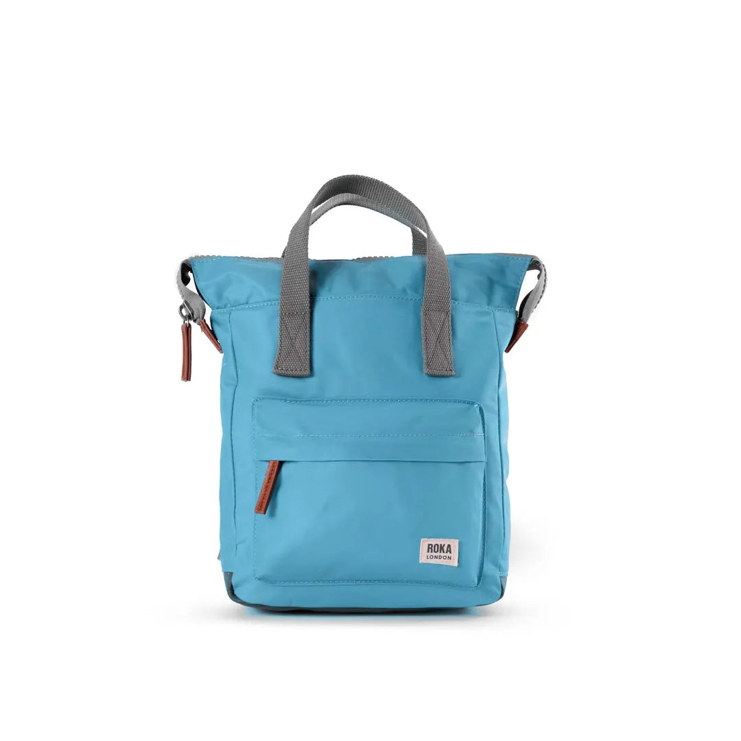 Roka Bantry B Petrol Recycled Nylon backpack in blue with gray handles and brown accents, durable eco-friendly design.