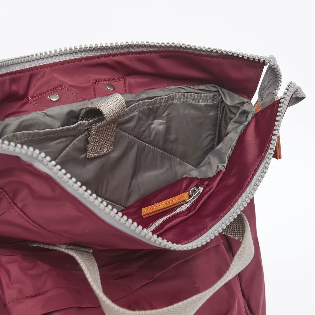 Roka Bantry B Plum recycled nylon tote bag with interior zip pocket and beige handles, eco-friendly and stylish.