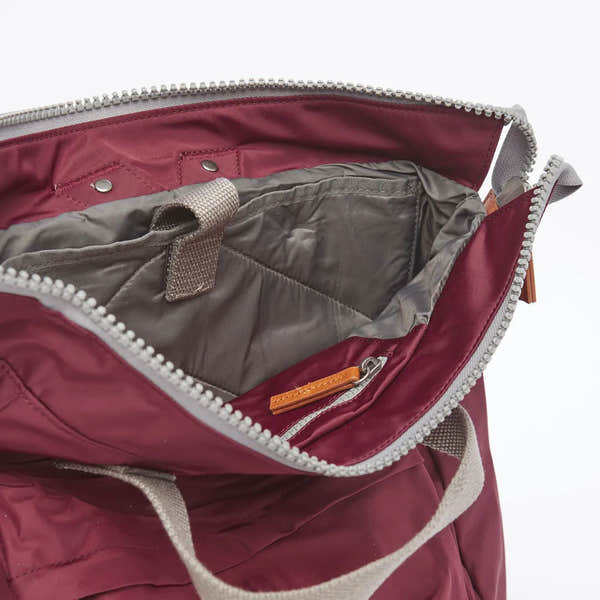 Roka Bantry B Plum recycled nylon tote bag with interior zip pocket and beige handles, eco-friendly and stylish.