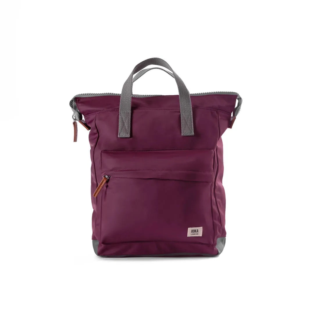 Roka Bantry B Plum recycled nylon backpack with front zipper pocket, gray handles, and durable design.