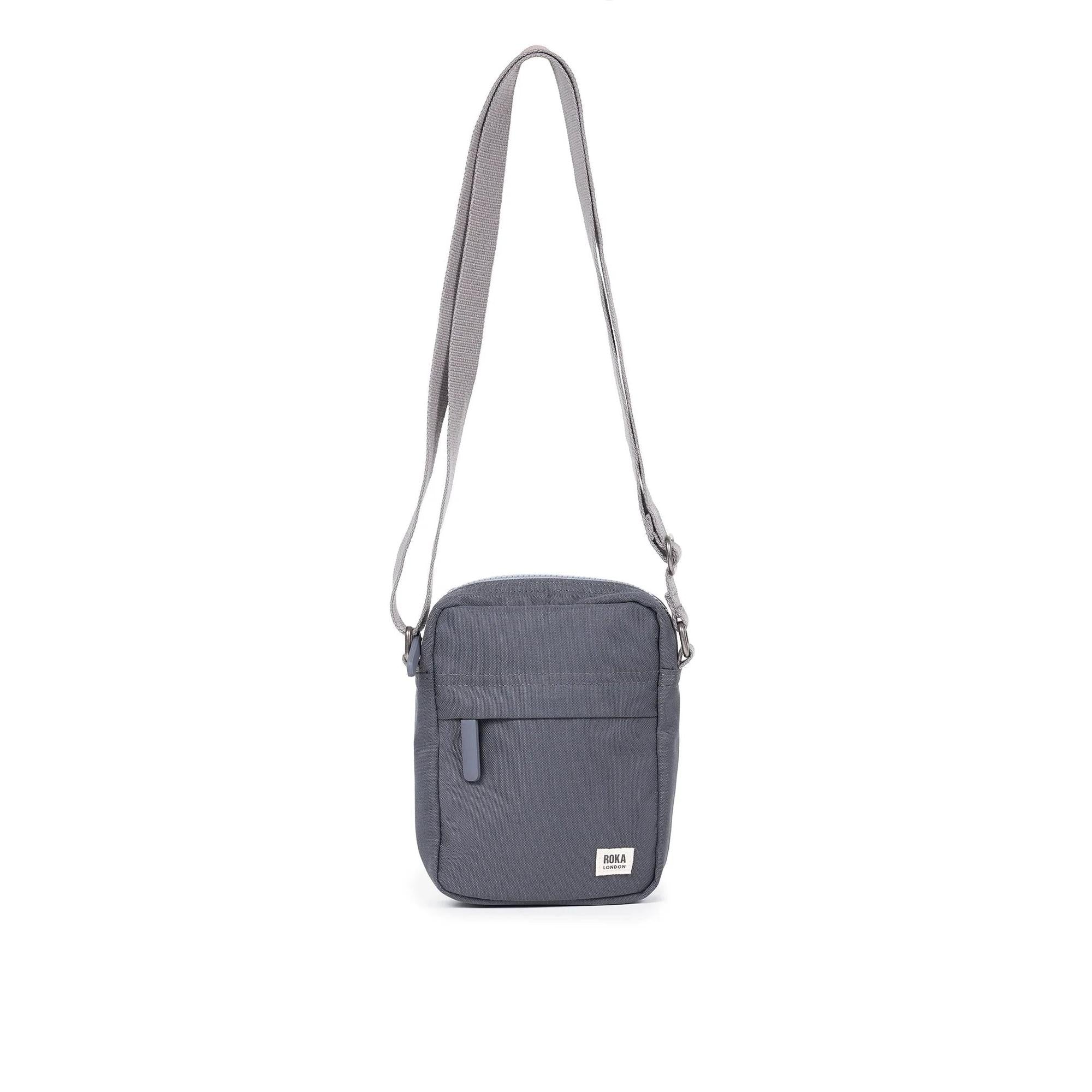 Roka Bond Faded Black recycled canvas crossbody bag, one size, with adjustable strap and front zip pocket.