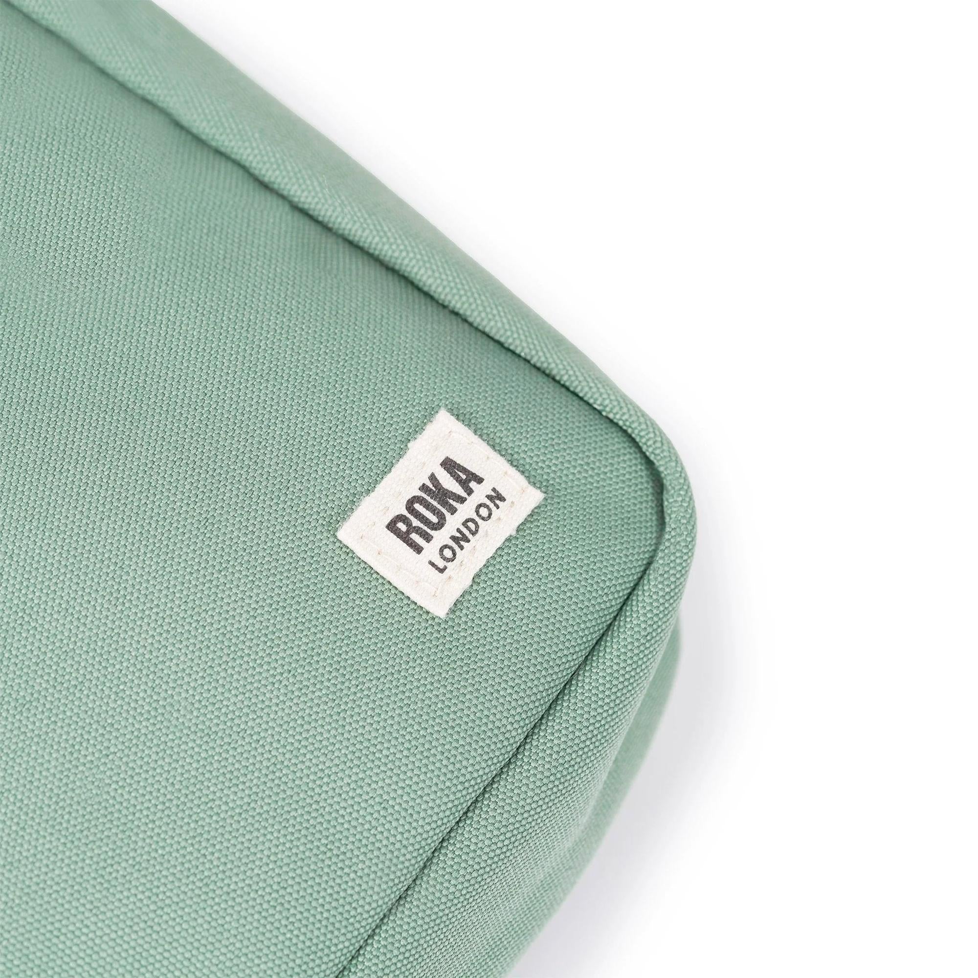 Roka Bond Frost recycled canvas bag, one size, mint green with Roka London label detail.
