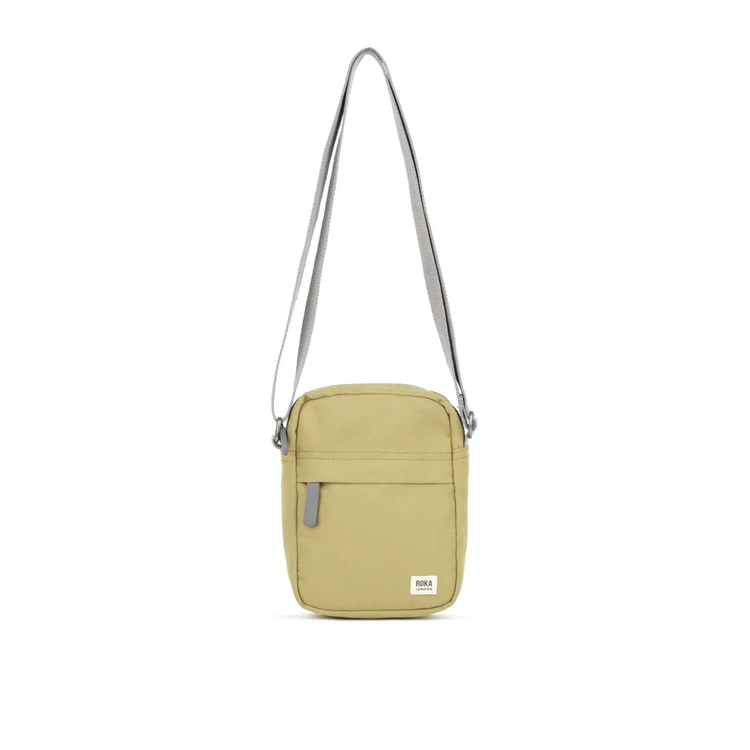 Roka Bond Khaki Recycled Canvas Crossbody Bag with adjustable strap and front zipper pocket, one size, eco-friendly accessory.