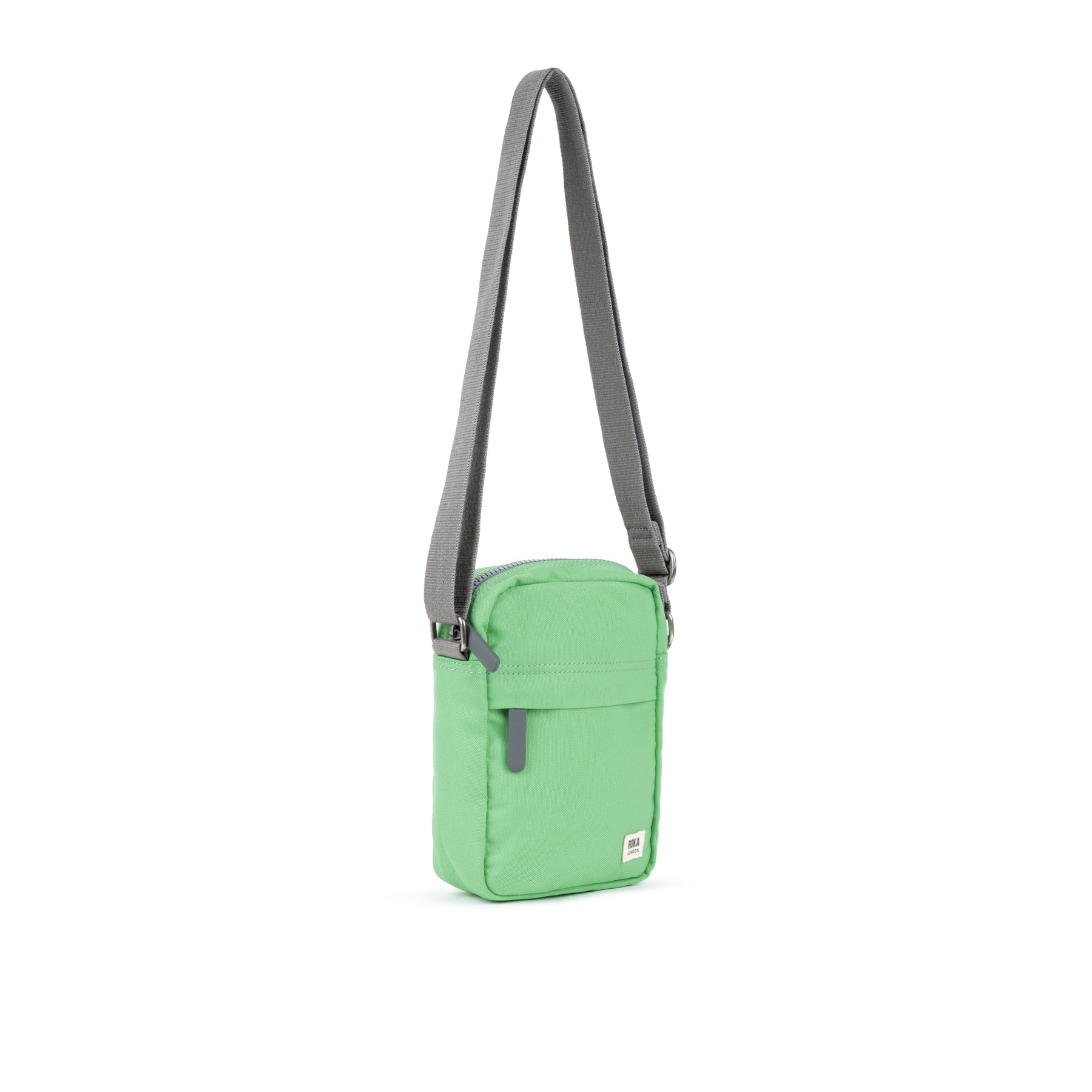 Roka Bond Recycled Canvas Peppermint crossbody bag with gray strap and front zipper pocket, eco-friendly design.