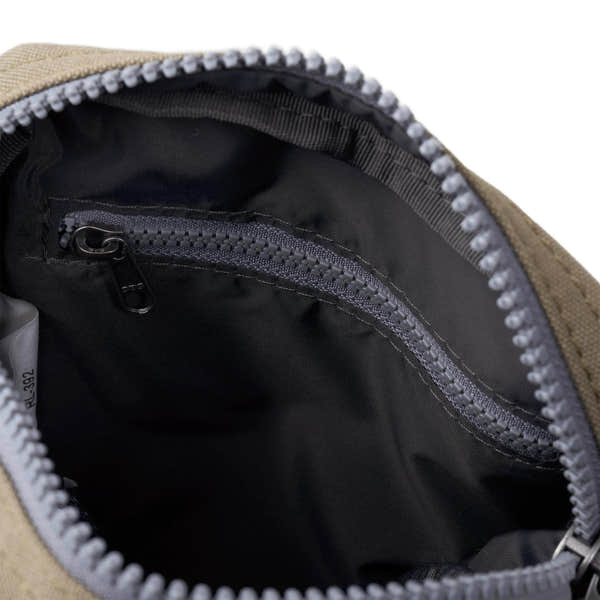 Roka Bond Taupe Recycled Canvas backpack interior with black lining and zippered pocket, one size.