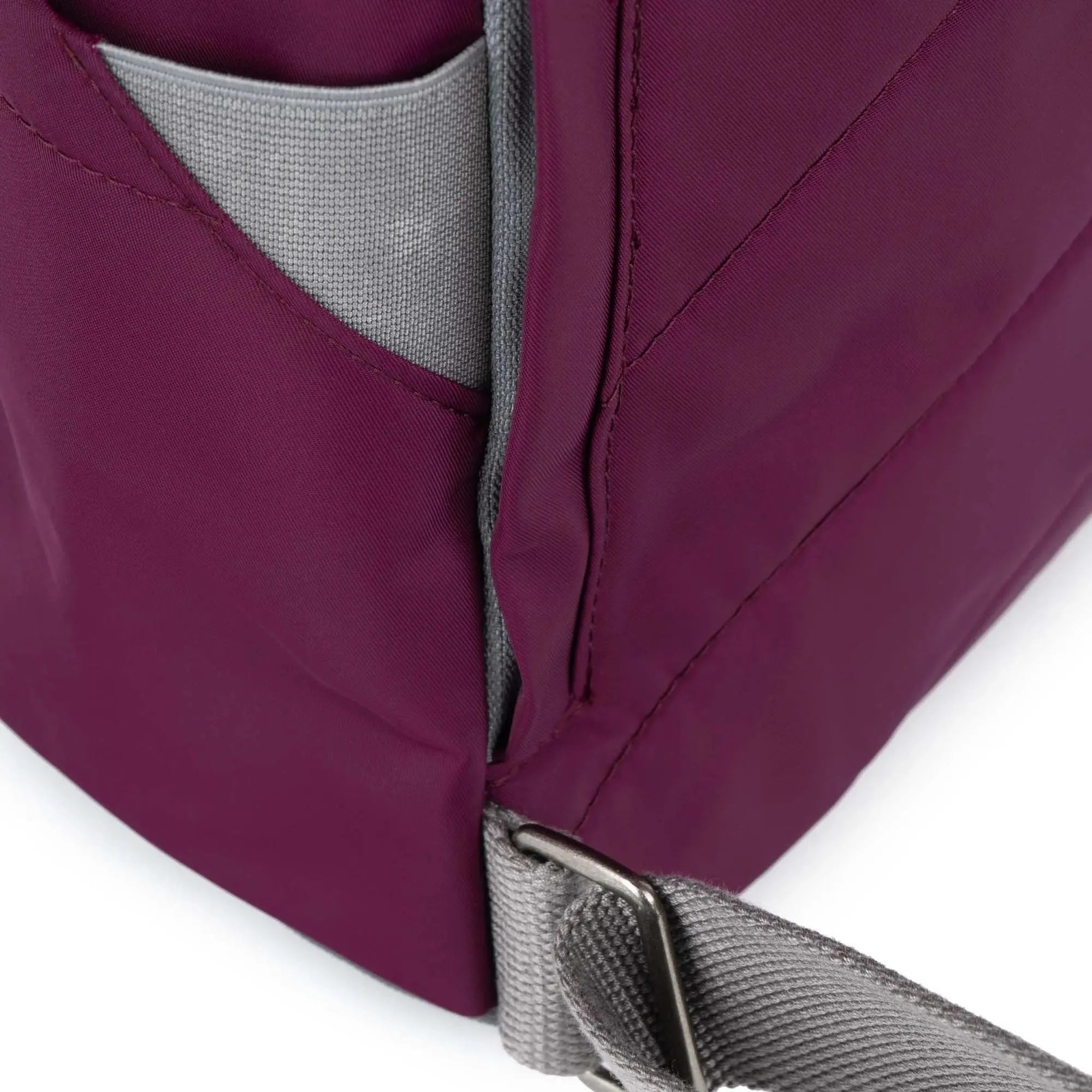 Roka Canfield B Royal Burgundy recycled nylon bag with grey strap, close-up of zipper and stitching details.