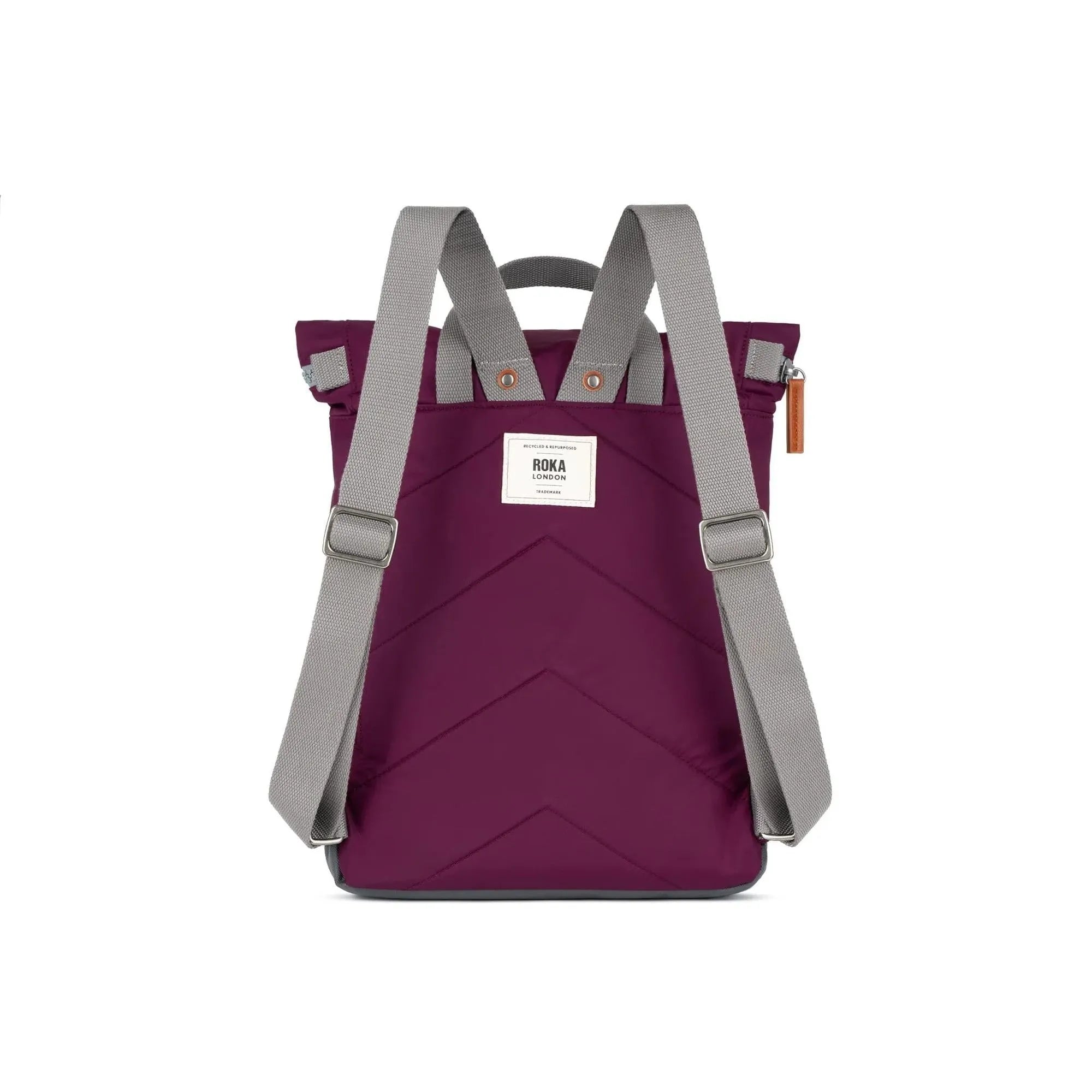 Roka Canfield B Royal Burgundy Recycled Nylon Backpack with gray adjustable straps and front logo patch.