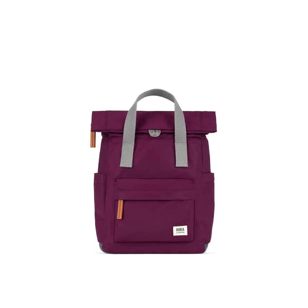 Roka Canfield B Royal Burgundy recycled nylon backpack with gray handles and front pocket.