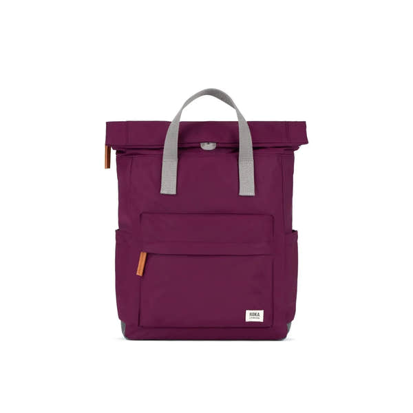 Roka Canfield B Royal Burgundy Recycled Nylon backpack with gray handles and exterior pockets.