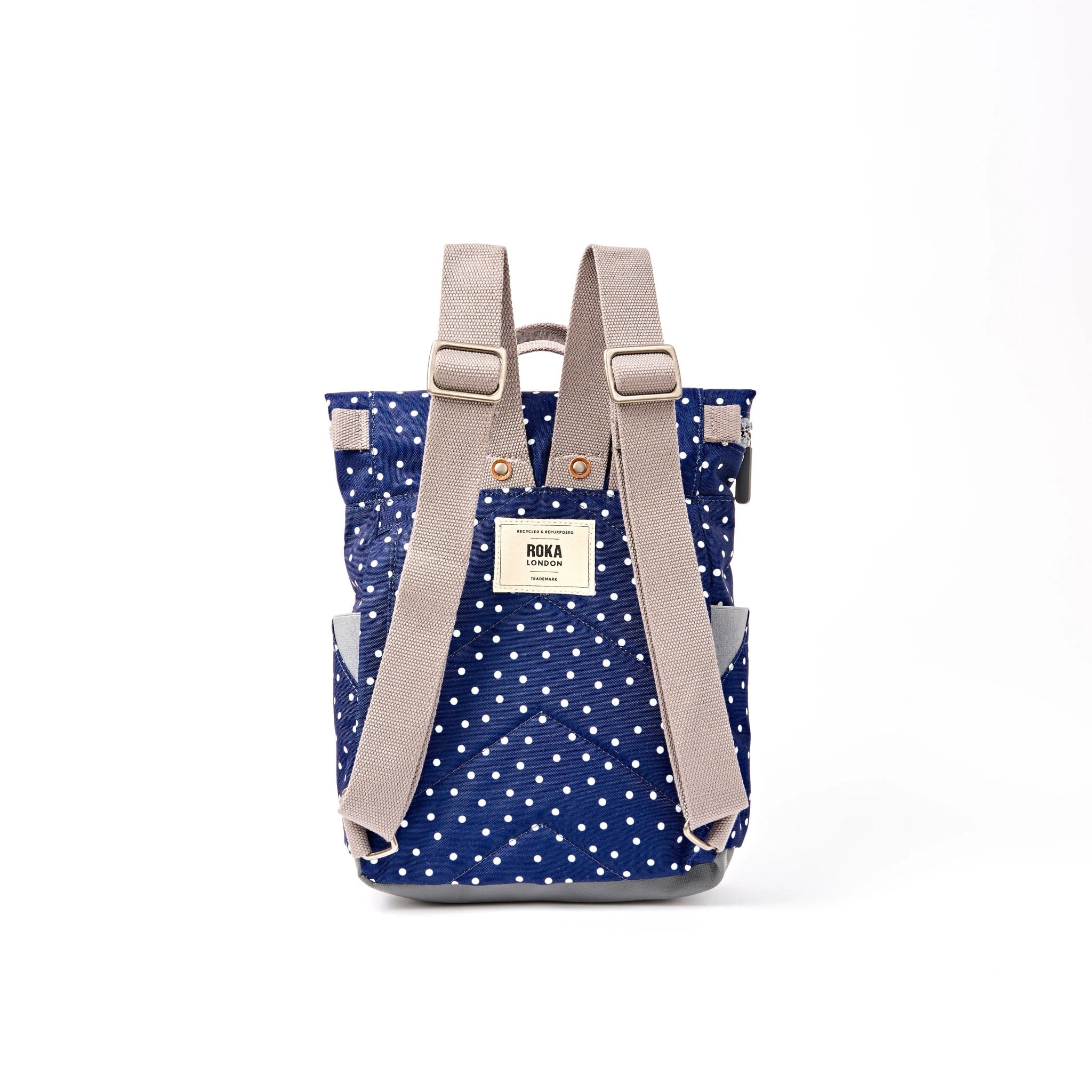 Roka Canfield Small Navy Polka Dot Recycled Canvas Backpack, back view.