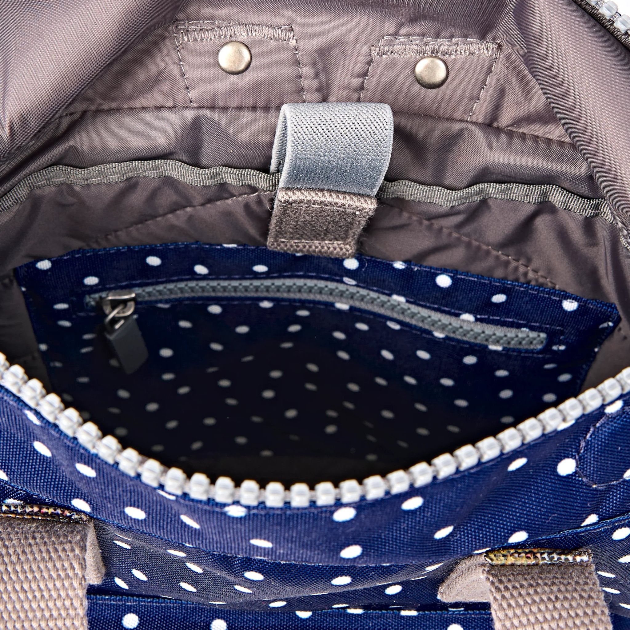 Roka Canfield Small Navy Polka Dot Recycled Canvas Backpack, first interior view.