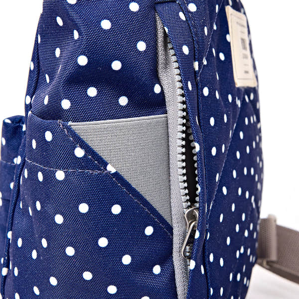 Roka Canfield Small Navy Polka Dot Recycled Canvas Backpack, hardware detail.
