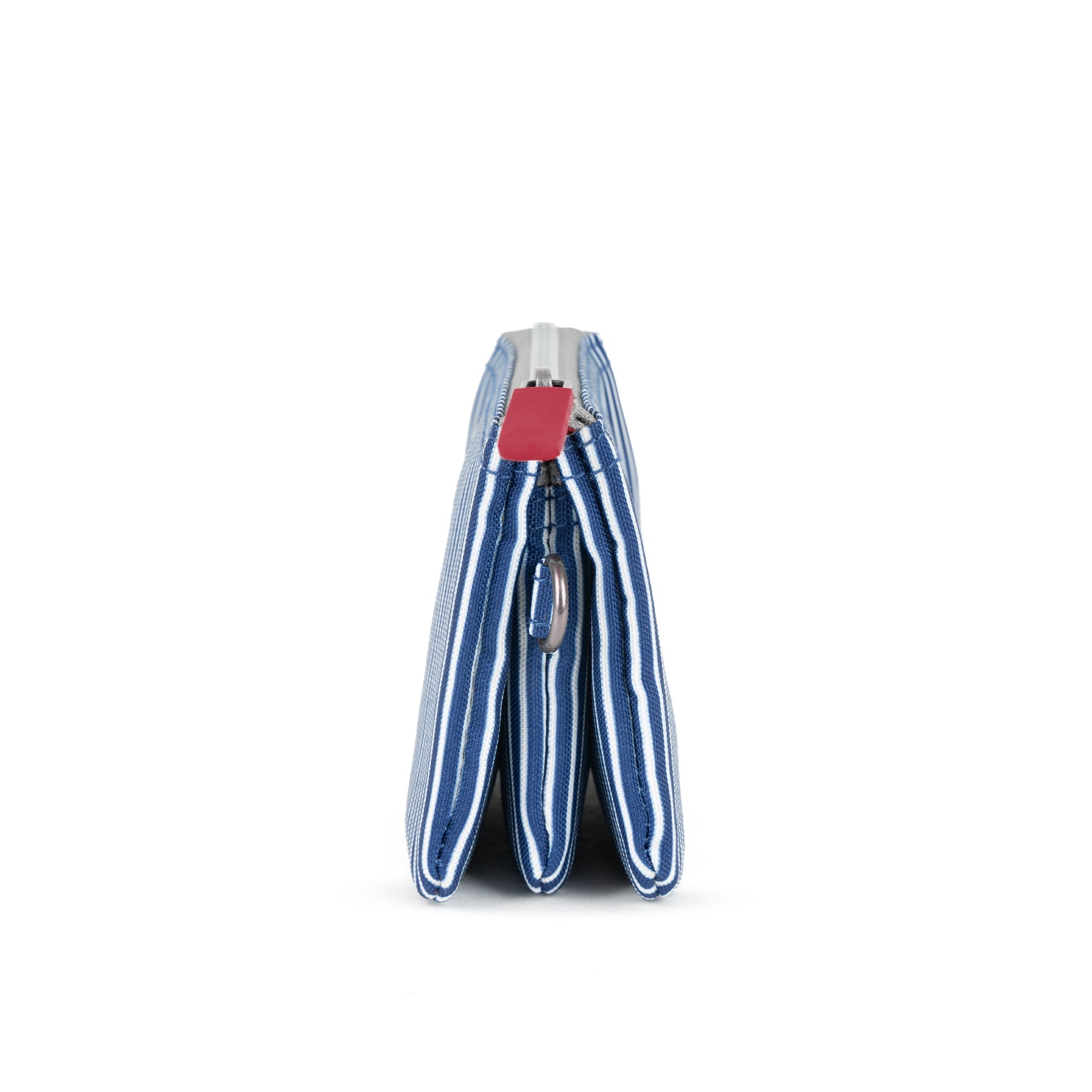 Roka Carnaby Blue Hickory Recycled Canvas bag with zipper, metal ring, and striped blue and white pattern.