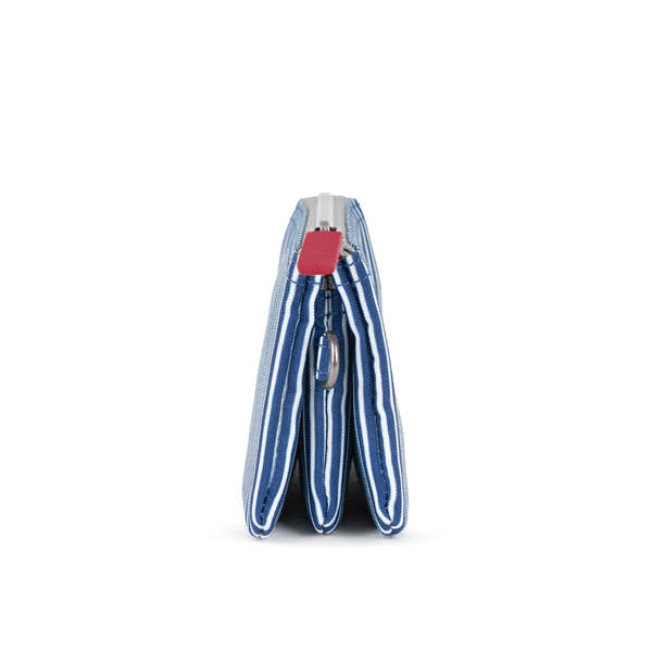 Roka Carnaby Blue Hickory Recycled Canvas bag with zipper, metal ring, and striped blue and white pattern.