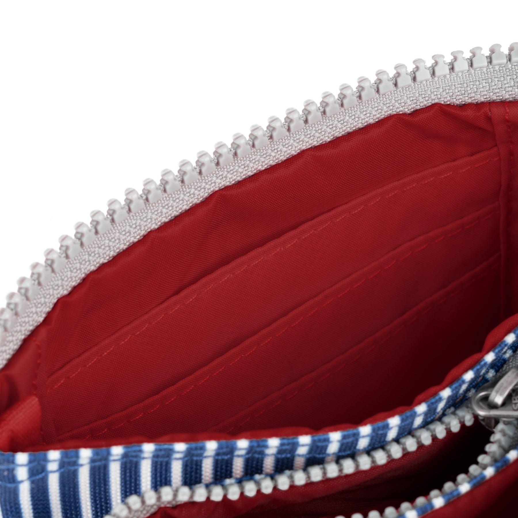 Roka Carnaby Blue Hickory Recycled Canvas bag with red interior, white zipper, and blue checkered fabric edge, eco-friendly and stylish.
