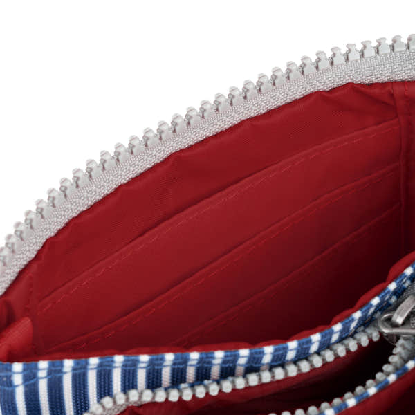 Roka Carnaby Blue Hickory Recycled Canvas bag with red interior, white zipper, and blue checkered fabric edge, eco-friendly and stylish.