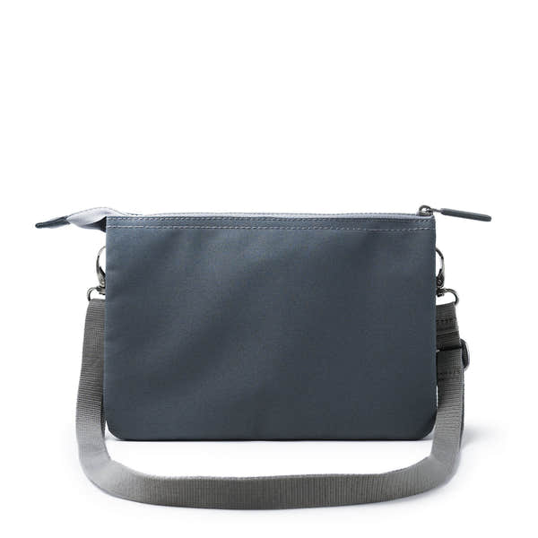 Roka Carnaby Crossbody Bag in Smoke XL recycled canvas with adjustable strap and zipper closure.