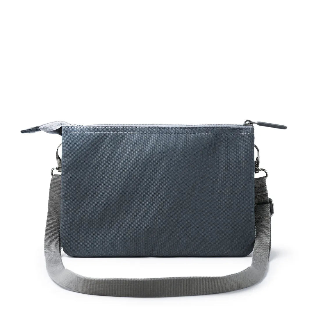 Roka Carnaby Crossbody Bag in Smoke XL recycled canvas with adjustable strap and zipper closure.
