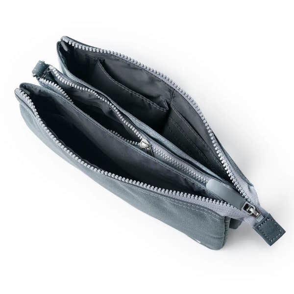 Roka Carnaby Crossbody Bag in Smoke XL recycled canvas, with multiple compartments, zip closures, and black interior lining.