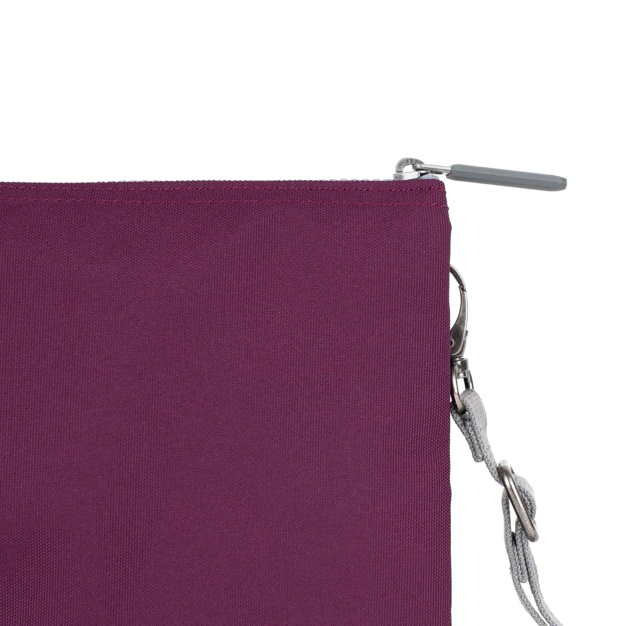 Roka Carnaby Crossbody XL in cherry lacquered recycled canvas, featuring a zip closure and silver-tone hardware.