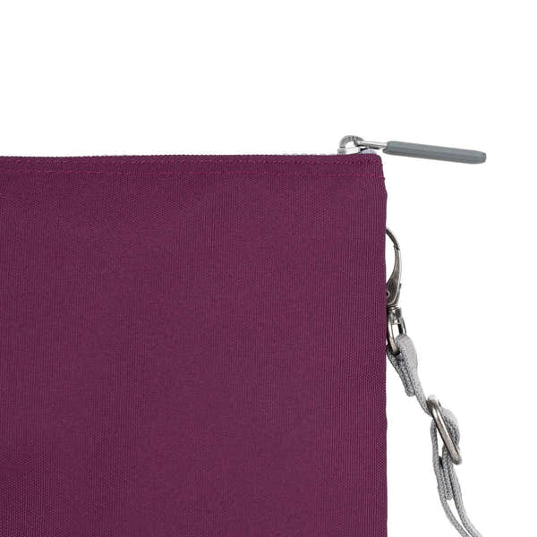 Roka Carnaby Crossbody XL in cherry lacquered recycled canvas, featuring a zip closure and silver-tone hardware.