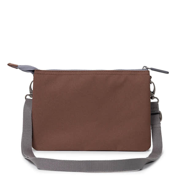 Roka Carnaby Crossbody XL bag in coco recycled canvas with adjustable gray strap and zip closure.