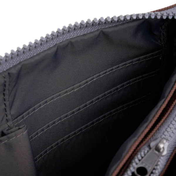 Roka Carnaby Crossbody XL in Coco recycled canvas, large interior with multiple compartments, black lining, and silver zipper.