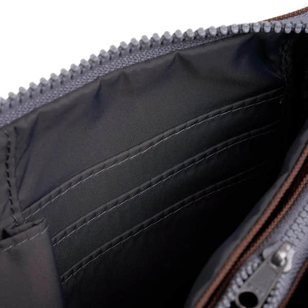Roka Carnaby Crossbody XL in Coco recycled canvas, large interior with multiple compartments, black lining, and silver zipper.
