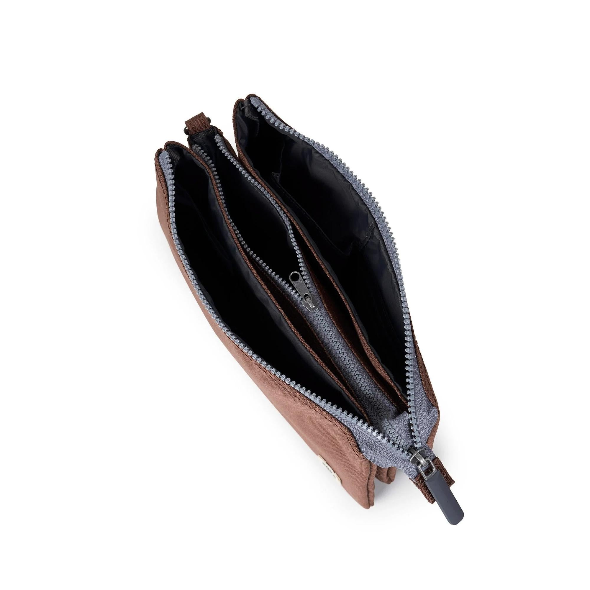 Roka Carnaby Crossbody XL bag in Coco recycled canvas, featuring spacious interior with multiple compartments and zipper closures.