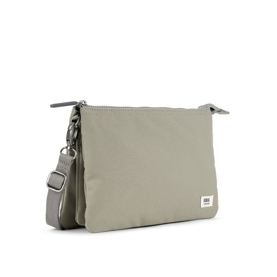 Roka Carnaby Crossbody XL in coriander recycled canvas, zip closure, adjustable strap, minimalist design, lightweight and eco-friendly.