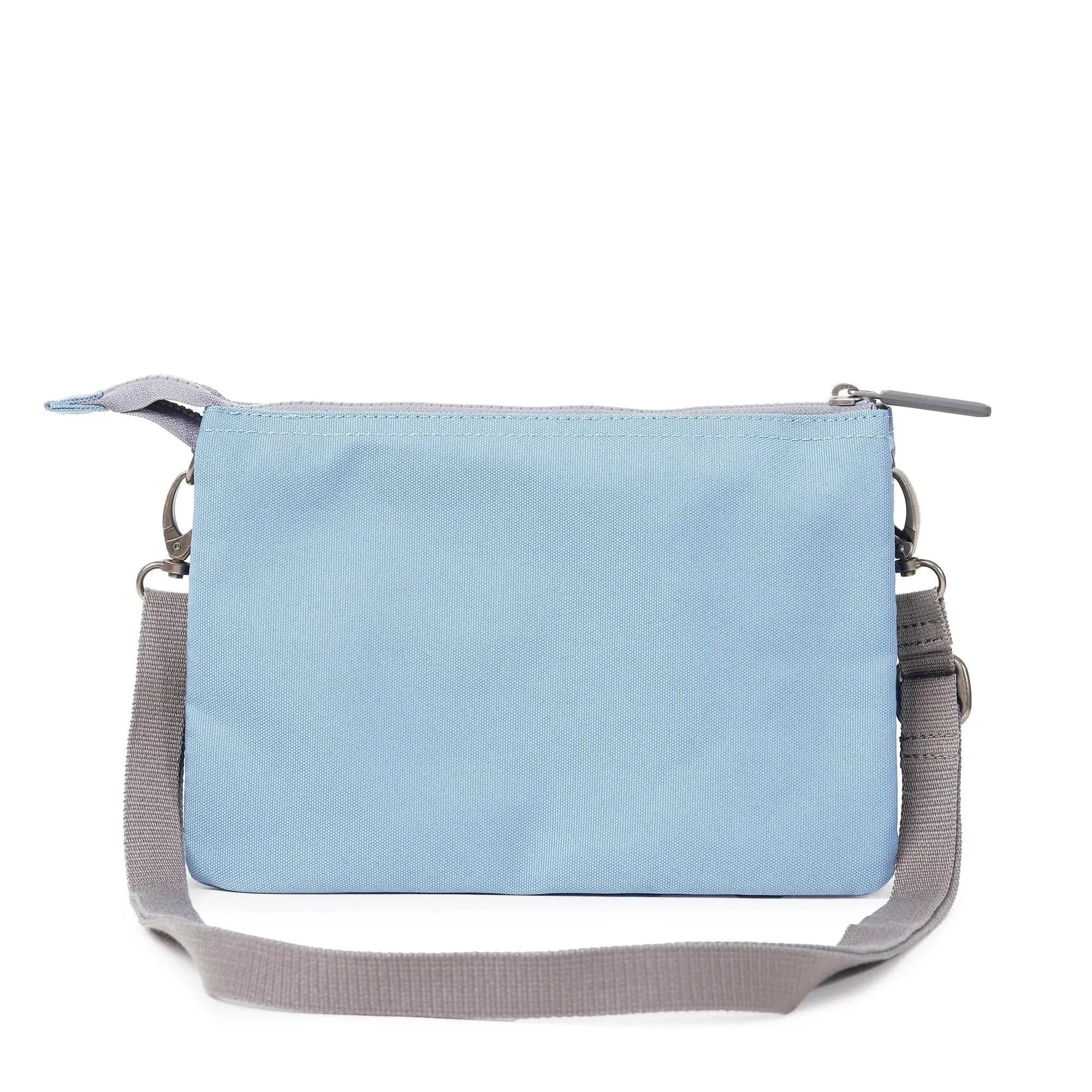 Roka Carnaby Crossbody XL in retro blue recycled canvas, large size with adjustable gray strap and zip closure.
