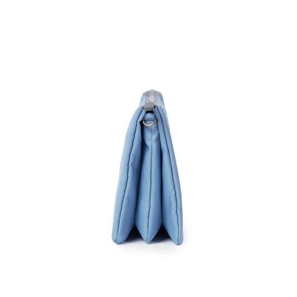 Roka Carnaby Crossbody XL in retro blue recycled canvas, an extra-large, stylish, and eco-friendly bag with side view.