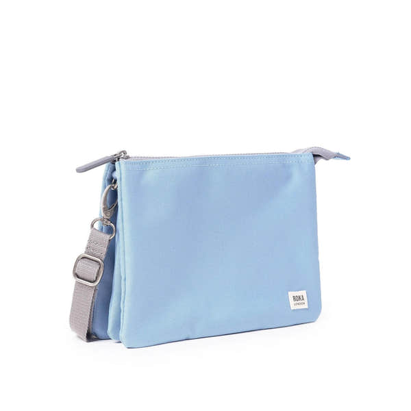 Roka Carnaby Crossbody XL in retro blue recycled canvas, large size with adjustable strap and silver hardware.