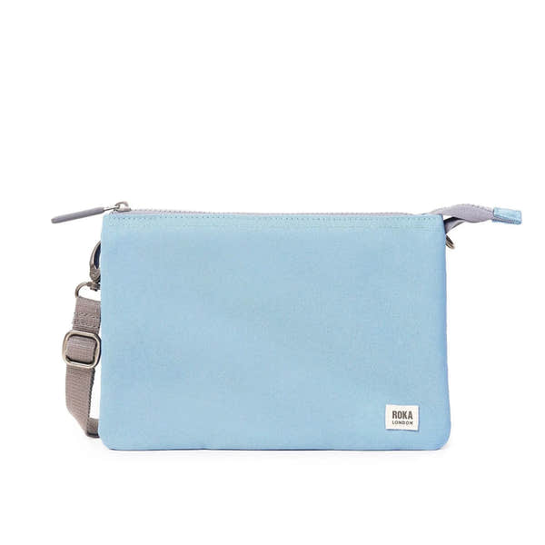 Roka Carnaby Crossbody XL in retro blue recycled canvas, oversized design, with adjustable strap and zipper closure.