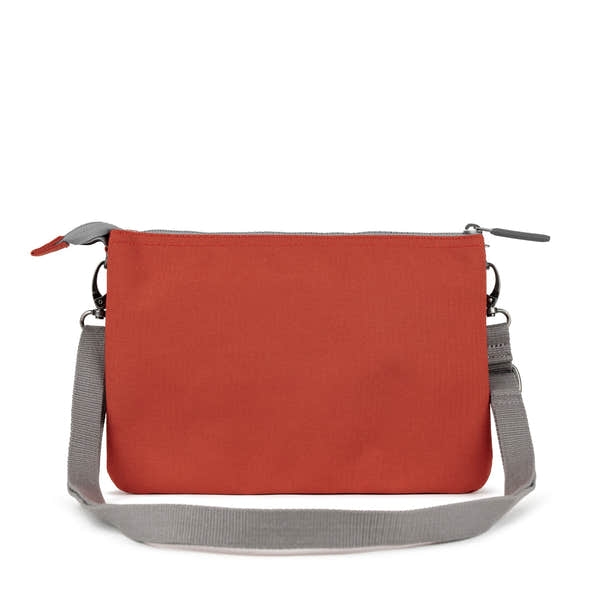 Roka Carnaby Crossbody XL bag in Rooibos recycled canvas with gray adjustable strap and zipper closure.