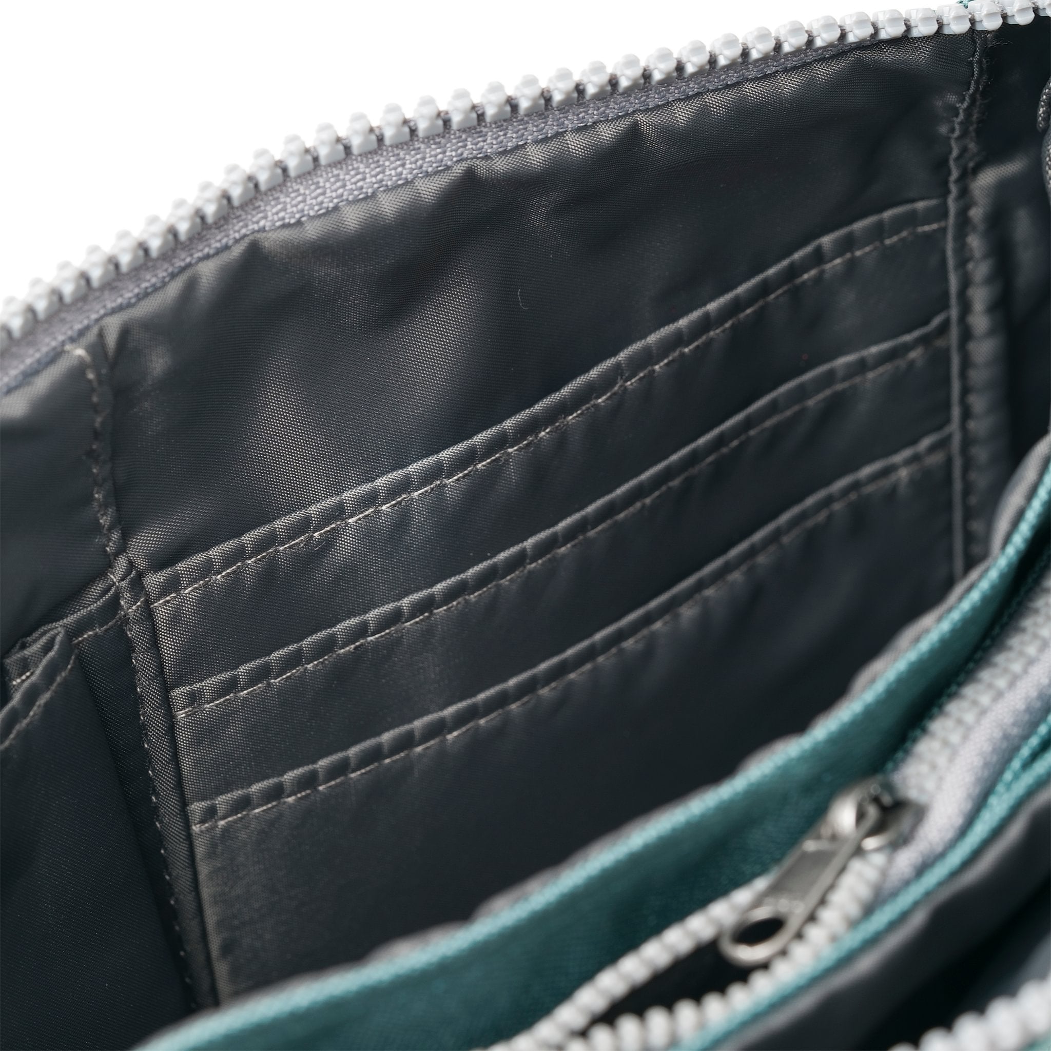 Roka Carnaby Crossbody XL Sage Recycled Canvas, side view.