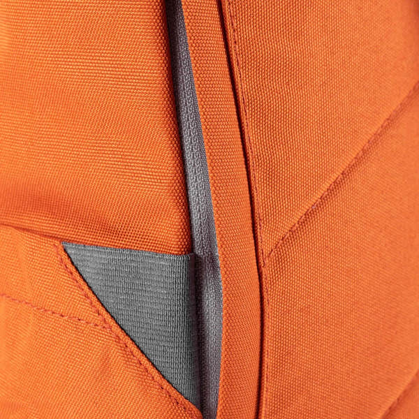 Close-up of an orange Roka Finchley A recycled canvas backpack with gray accents and stitching details.