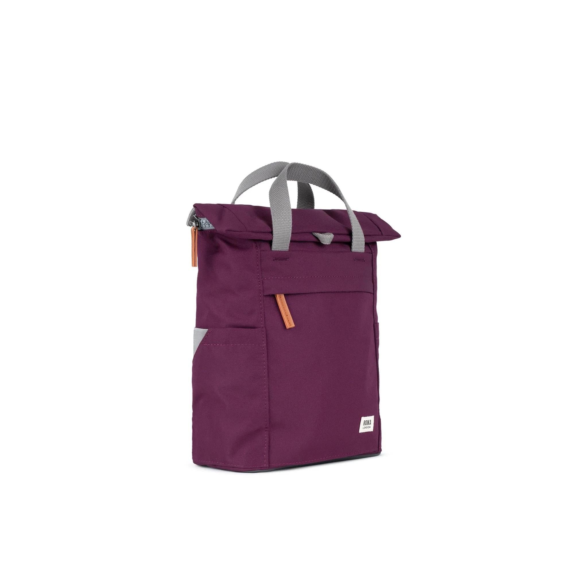 Roka Finchley A Cherry Lacquer Recycled Canvas tote bag with gray handles and orange zipper accents.