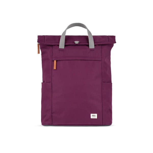 Roka Finchley A Cherry Lacquer Recycled Canvas backpack in cherry color with gray handle and leather accents.