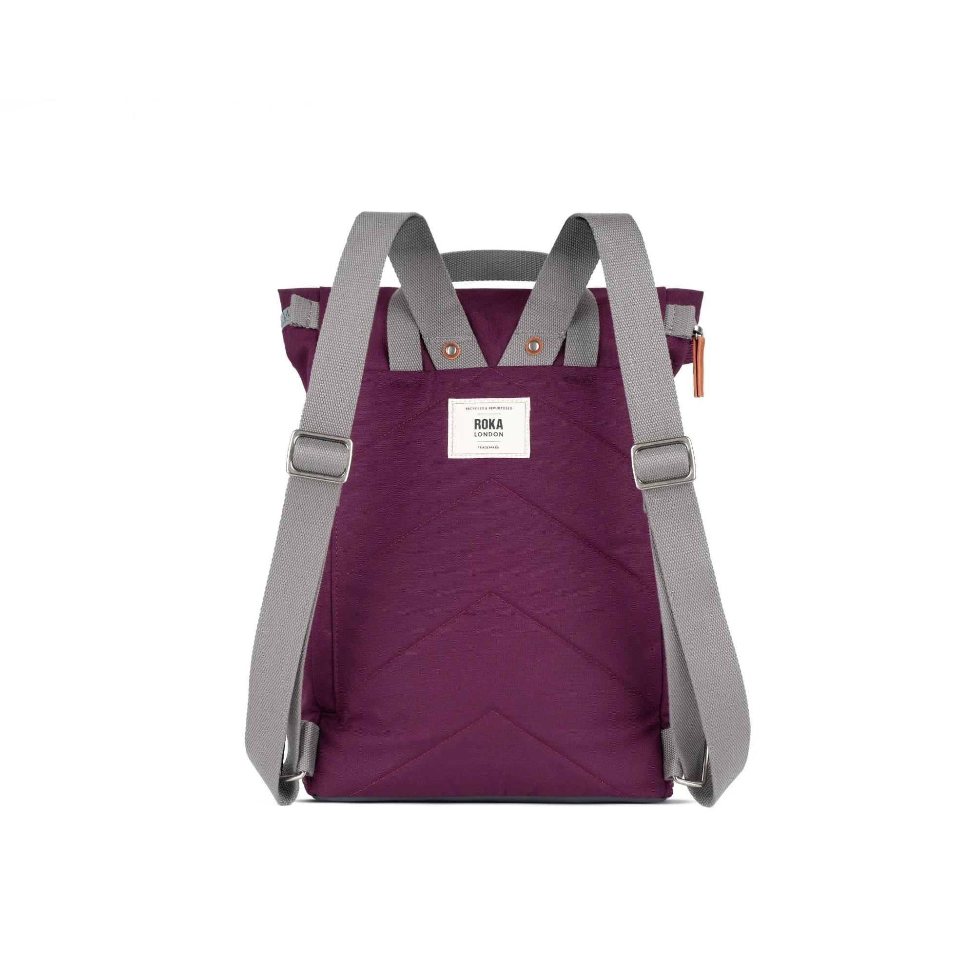 Roka Finchley backpack with cherry red lacquer recycled canvas, gray straps, and front label, stylish eco-friendly design.