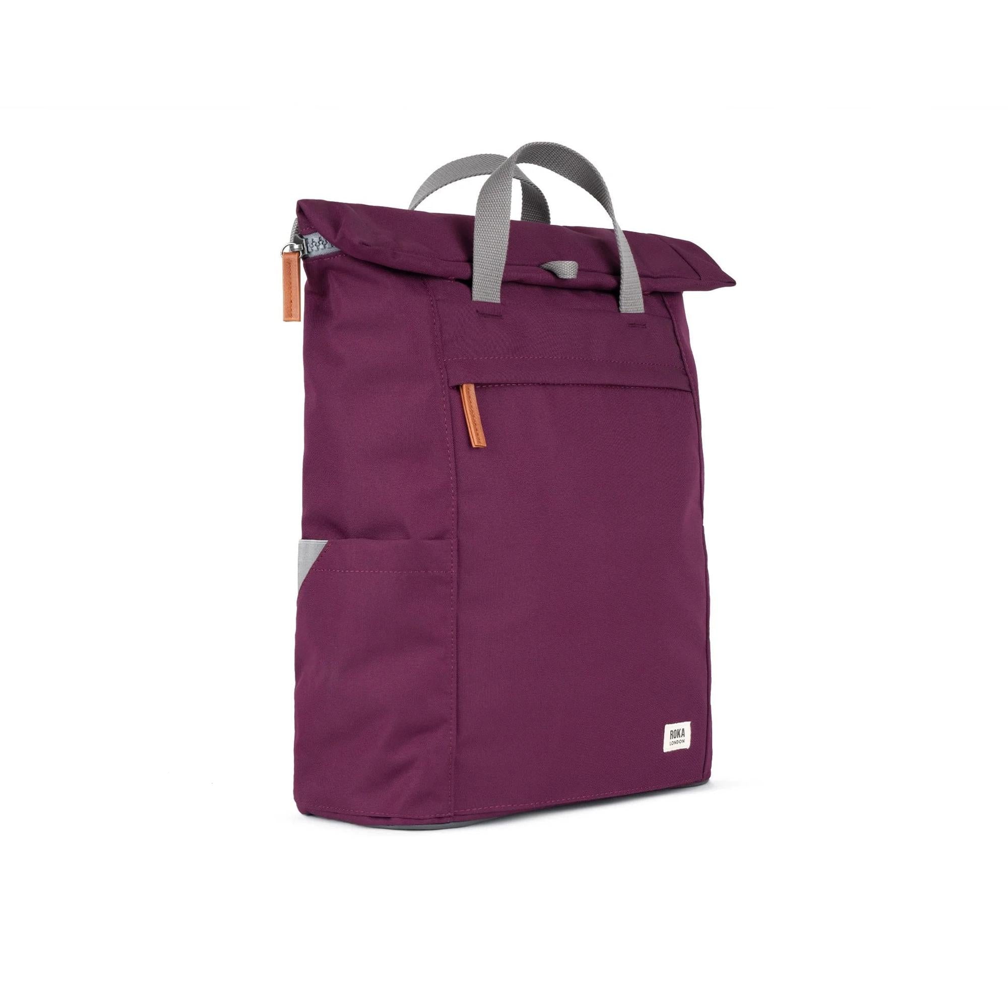 Roka Finchley A Cherry Lacquer Recycled Canvas backpack in deep cherry color with gray handles and orange zipper accents.