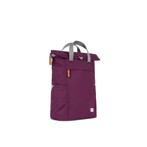 Roka Finchley A Cherry lacquered recycled canvas backpack with grey handles and orange accents.