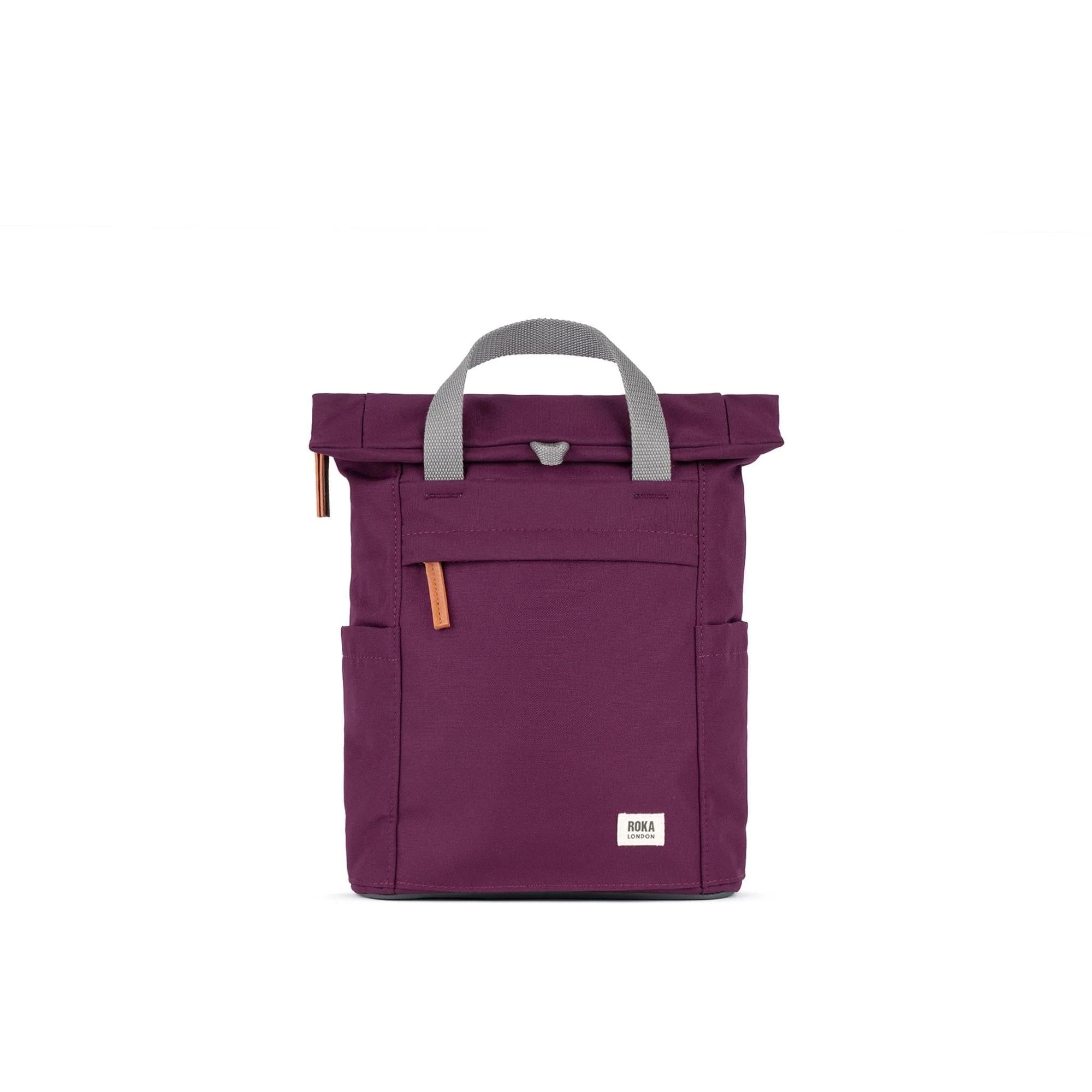 Roka Finchley A Cherry Lacquer Recycled Canvas backpack in purple with gray handles and tan zipper accents.