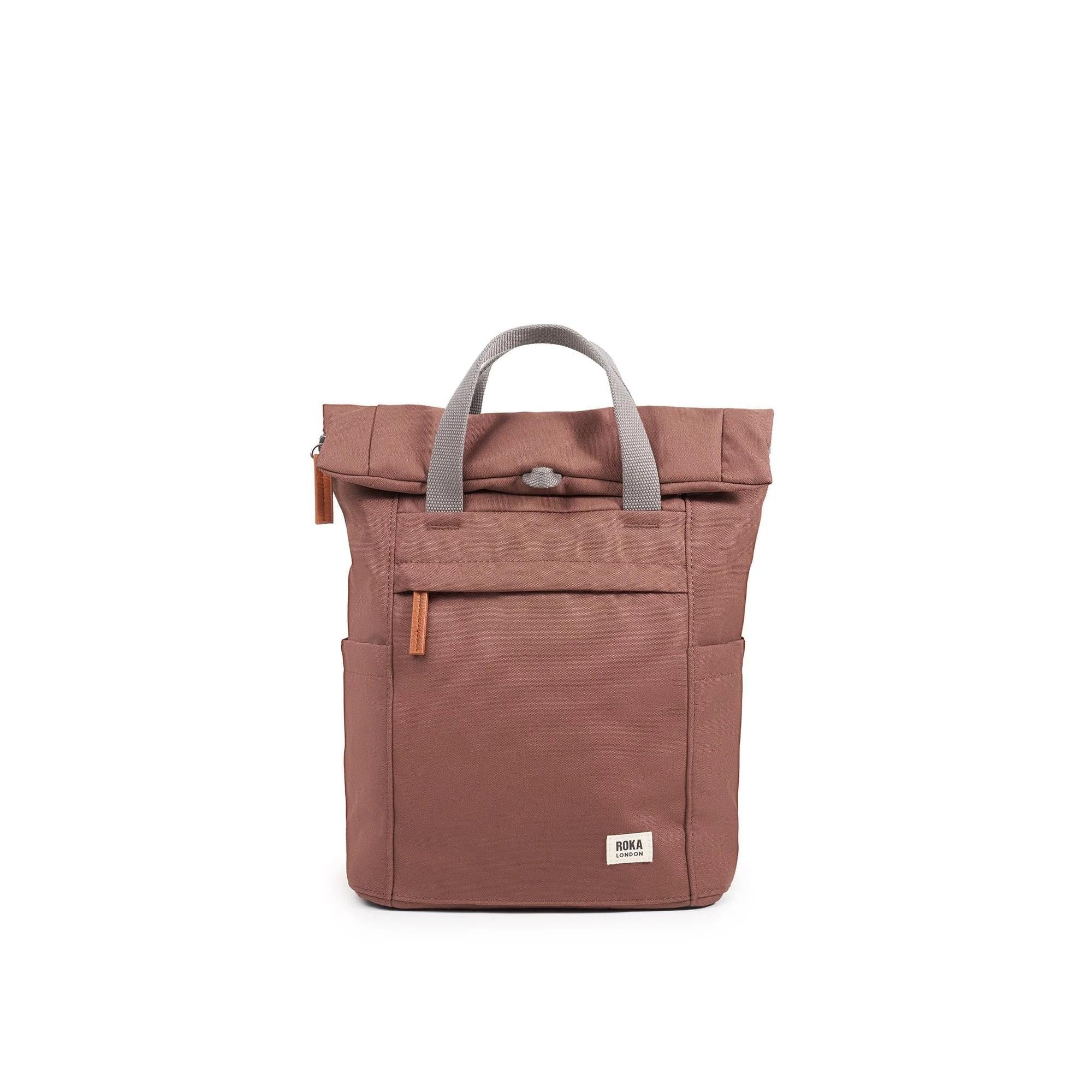 Roka Finchley A Coco recycled canvas backpack in muted pink with gray handles and small front pocket, eco-friendly and stylish.