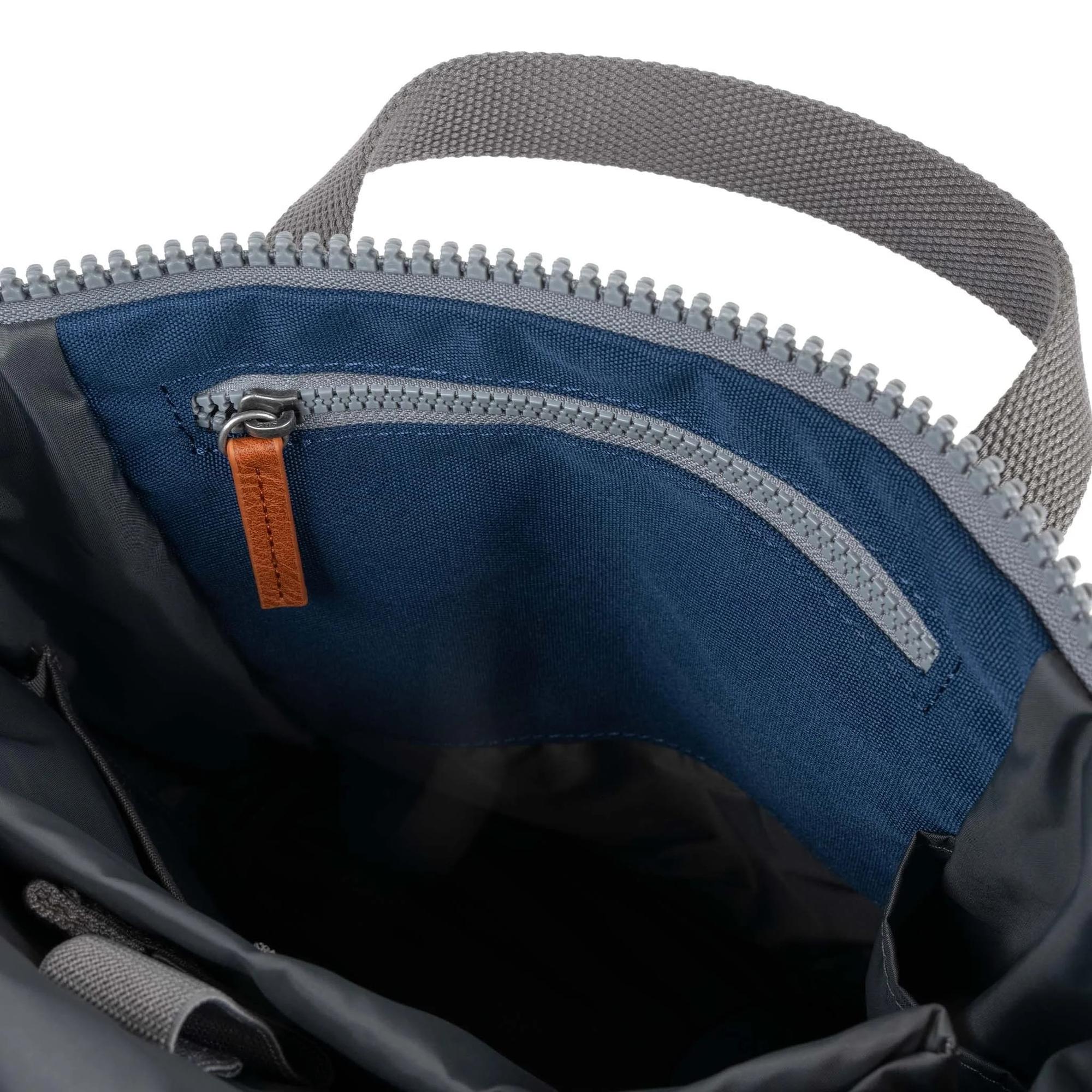 Roka Finchley blue recycled canvas bag interior with zip pocket, durable handle and spacious design.