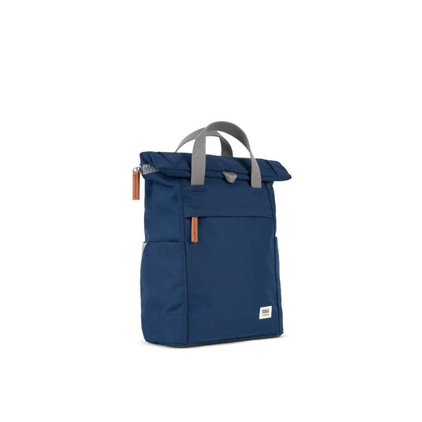 Roka Finchley backpack in blue recycled canvas with gray handles and orange zipper pulls, stylish eco-friendly everyday bag.