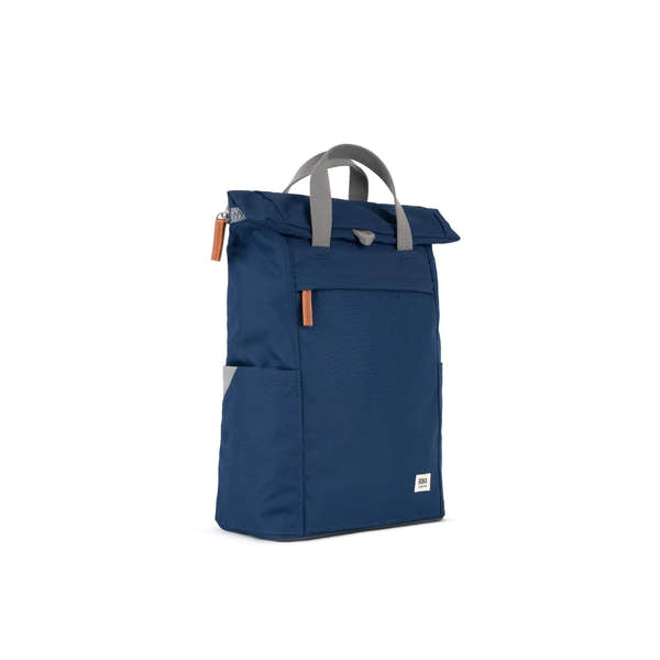 Roka Finchley blue recycled canvas backpack with grey handle and orange zipper accents.
