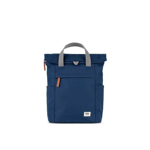 Roka Finchley backpack in crisp blue recycled canvas with grey handles and leather accents.